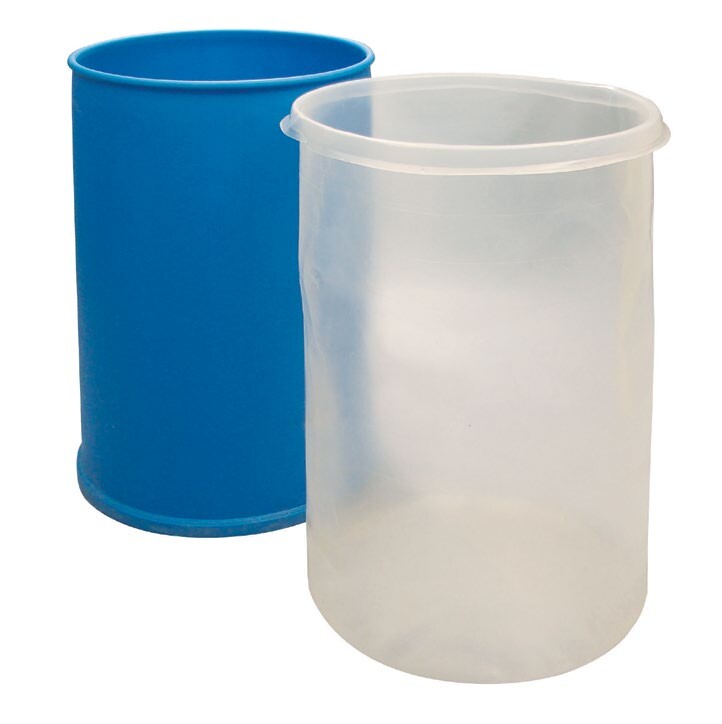 Form-fit rigid drum liner next to an open drum
